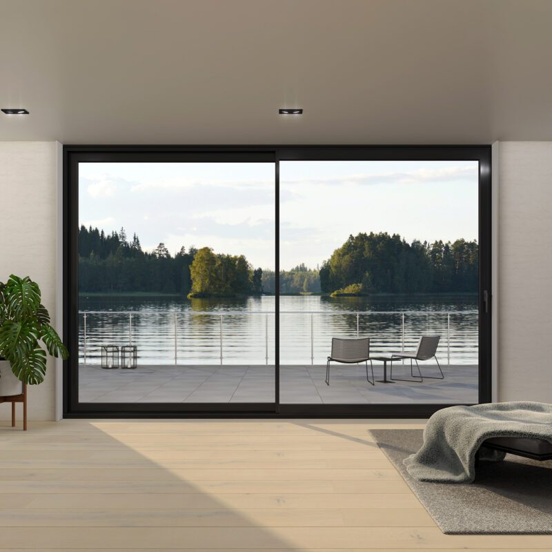 Fasadpartier glaspartier med svarta partier i arkitektritat hus